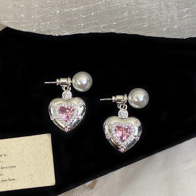 Star-themed earrings with zircon accents and a matching necklace set.