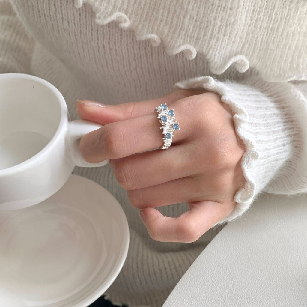 S925スターリングシルバー イレギュラーフォールド シーブルージルコンリング