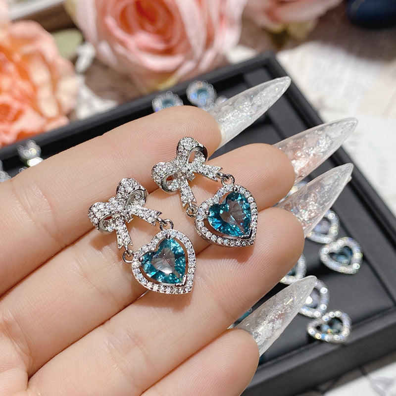 Aquamarine plated 18K gold love bow earrings